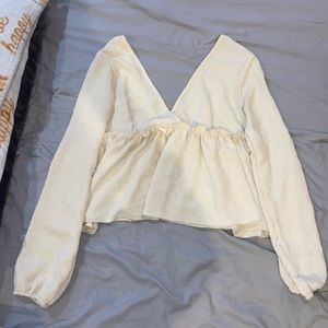 White/cream polkadot blouse